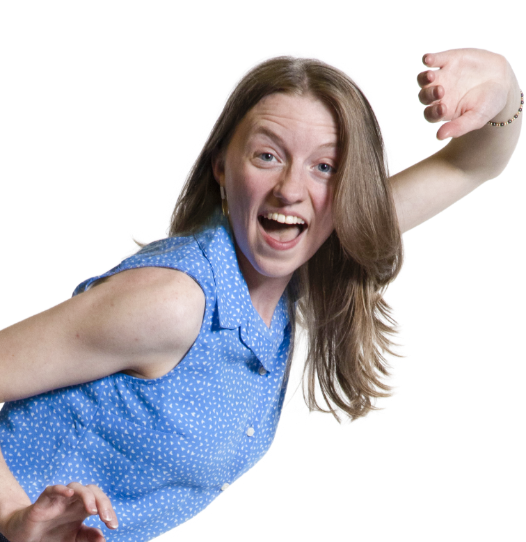 Smiling woman in a blue sleeveless shirt strikes a playful pose against a white background.