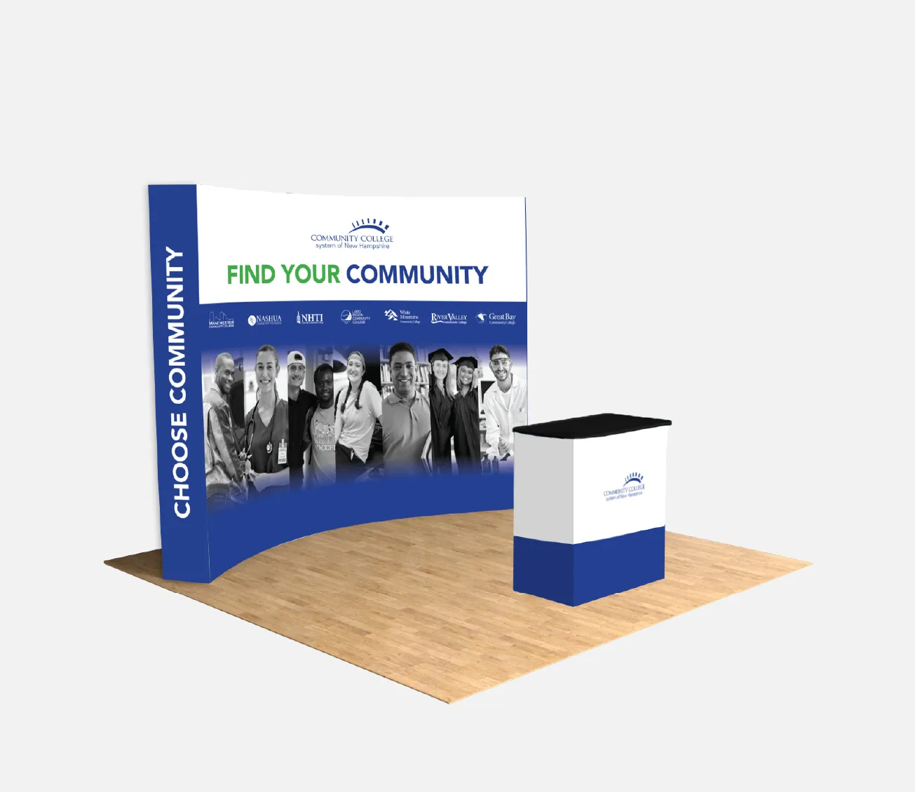 College event booth display with Find Your Community text, photos of people, and a branded counter on wood floor.