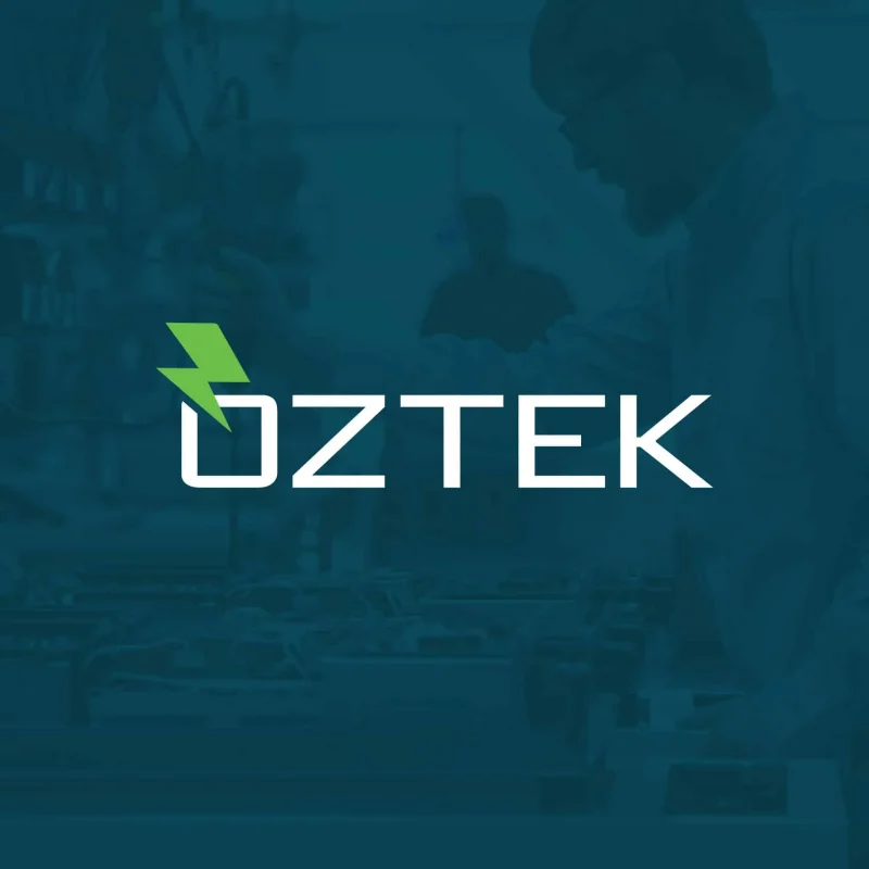 OZTEK logo with a green lightning bolt above the text, subtle image of a person working in the background&mdash;perfect for marketing professionals seeking dynamic branding.